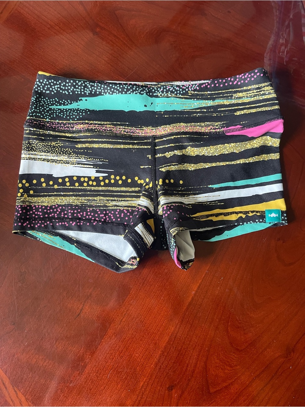 High-Rise Performance Athletic Shorts — Black with Teal, Pink & Gold Accents